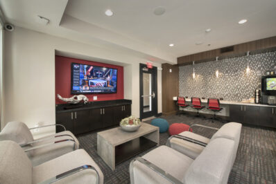 Interior lounge with seating and TV